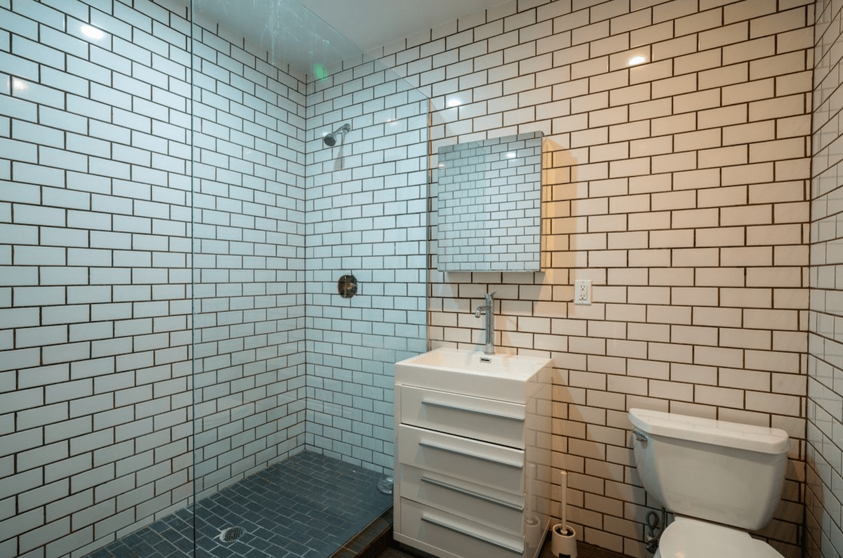 Want exposed brick? There’s plenty of it in this Chinatown two bedroom